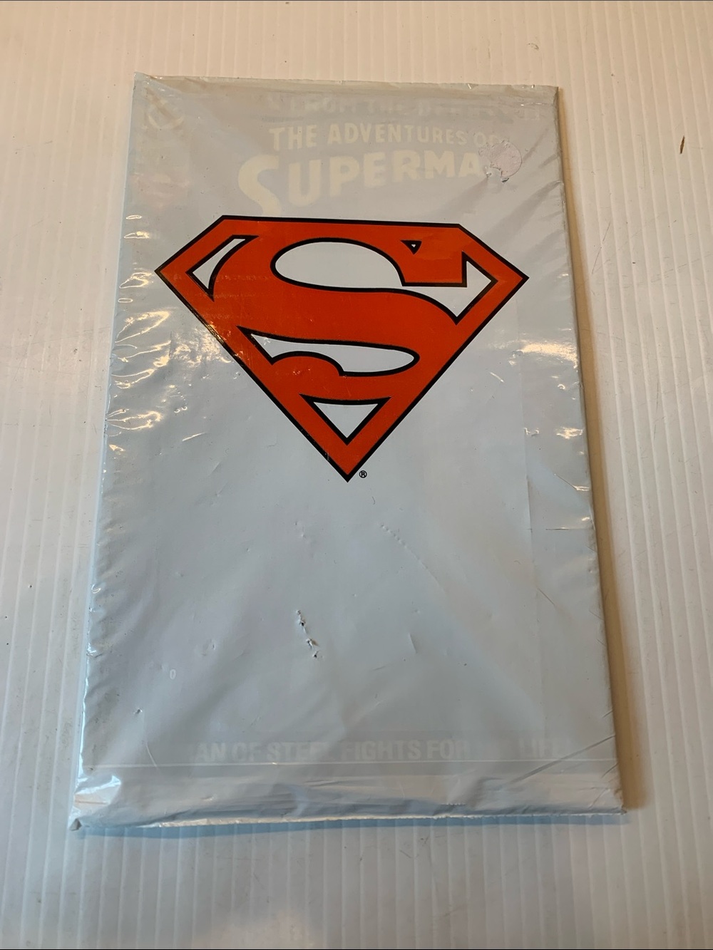 DC Comics White Comic with Orange Superman Shield